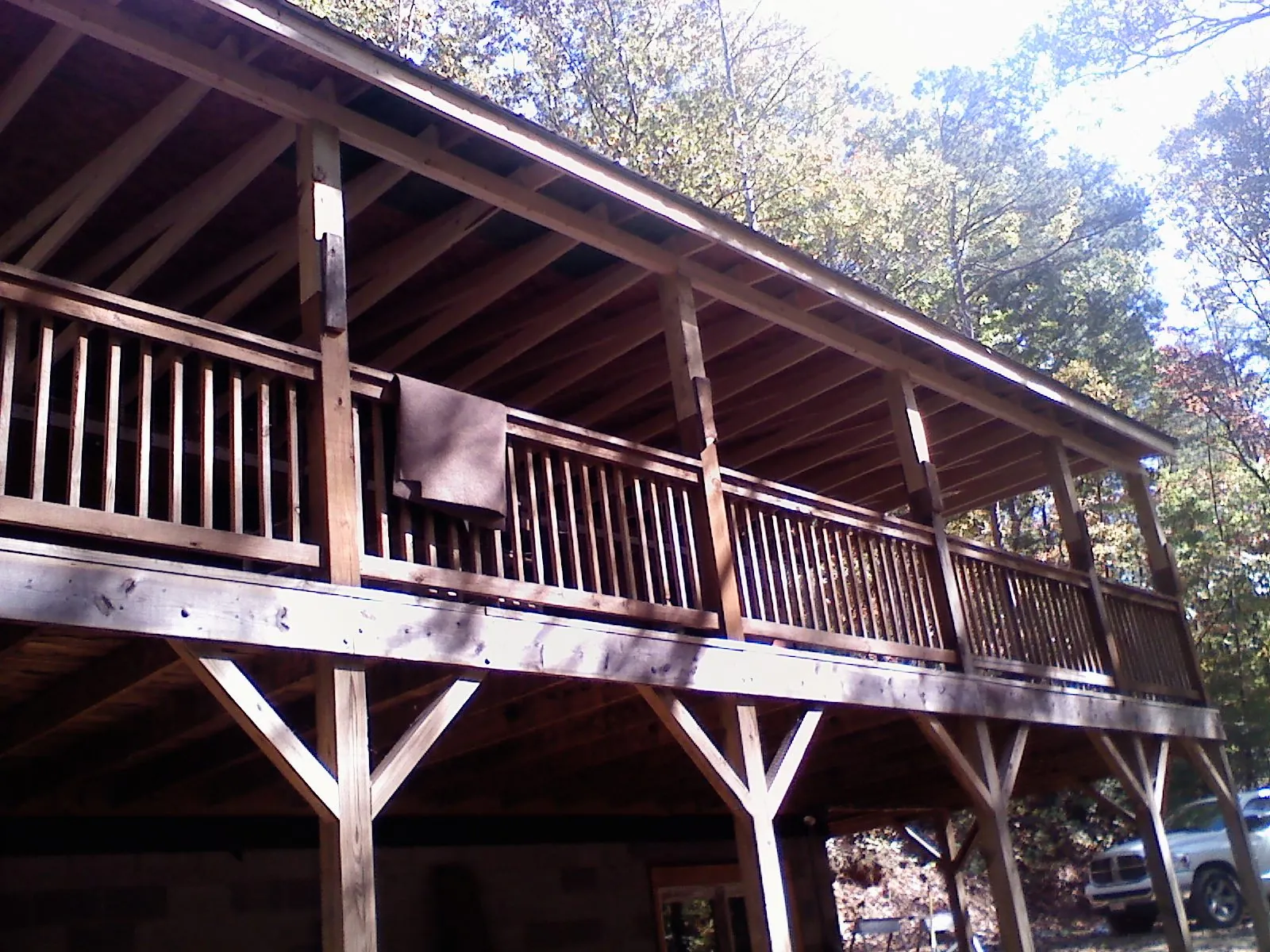 Timber framing under a new elevated porch and deck — Roof Leak Repair in Sugar Hill by Roofing Brothers